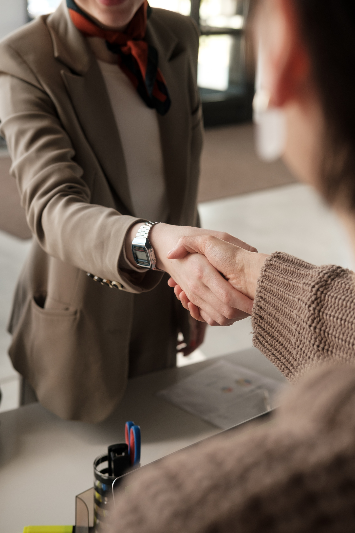 Two People Shaking Hands